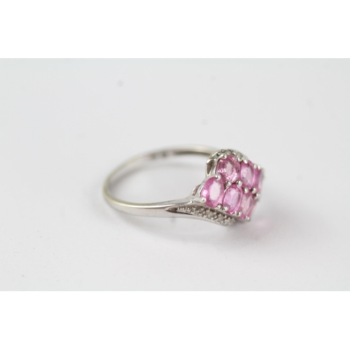 63 - 9ct gold pink sapphire & diamond cluster ring (2.4g) Size  O