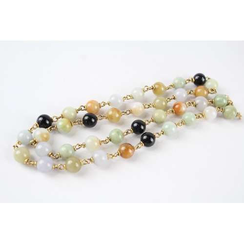 65 - 9ct gold onyx & quartzite bead necklace (39.2g)