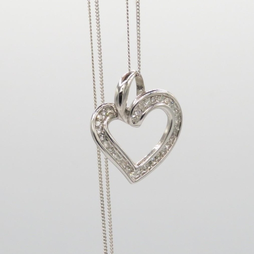 69 - 10ct gold heart pendant on a 9ct gold chain (2.3g)