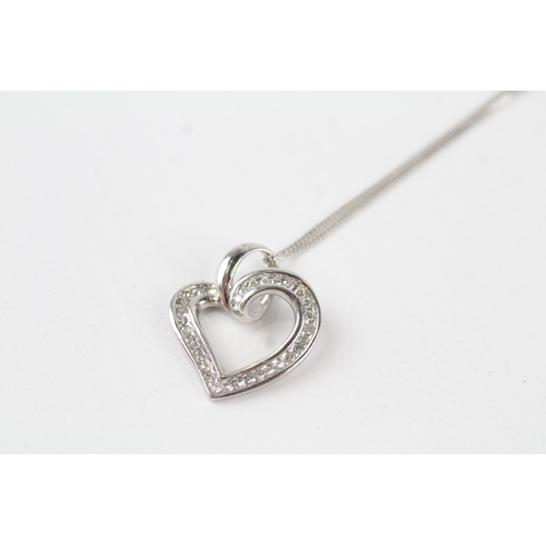 69 - 10ct gold heart pendant on a 9ct gold chain (2.3g)