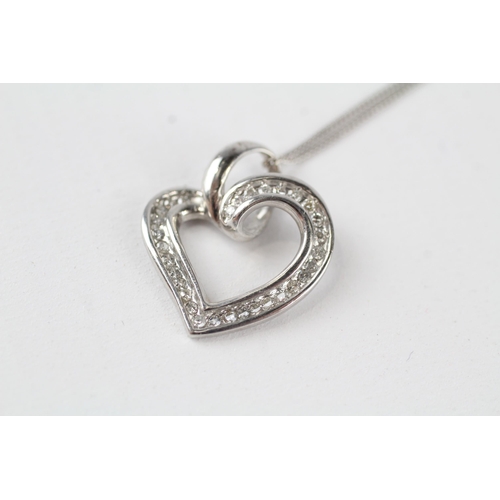 69 - 10ct gold heart pendant on a 9ct gold chain (2.3g)