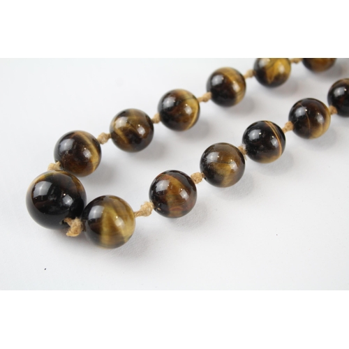 70 - 9ct gold tigers eye bead necklace (68g)