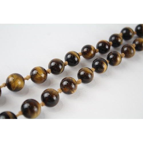 70 - 9ct gold tigers eye bead necklace (68g)