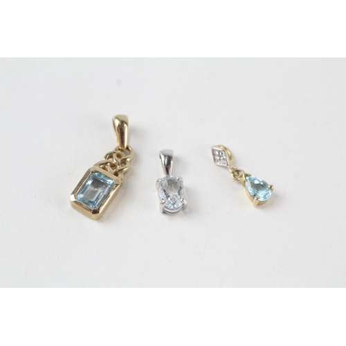 73 - 3 x 9ct white & yellow gold gemstone pendants set with diamond, topaz & aquamarine (3g)