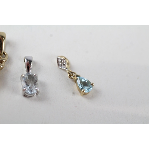 73 - 3 x 9ct white & yellow gold gemstone pendants set with diamond, topaz & aquamarine (3g)