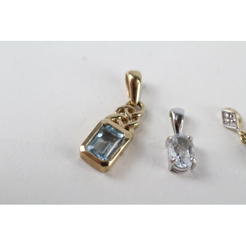 73 - 3 x 9ct white & yellow gold gemstone pendants set with diamond, topaz & aquamarine (3g)