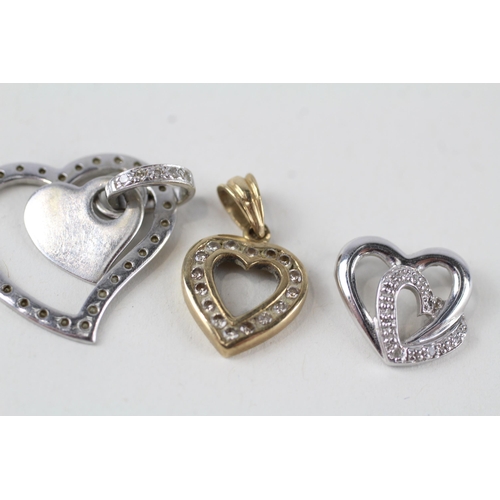 86 - 3 x 9ct white & yellow gold heart pendants (4.1g)