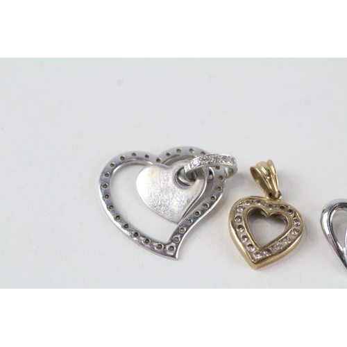 86 - 3 x 9ct white & yellow gold heart pendants (4.1g)