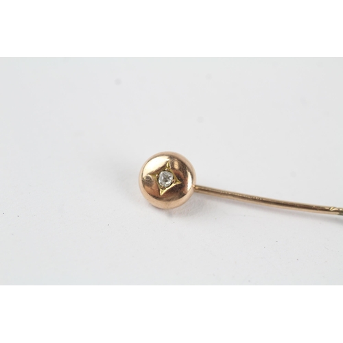 98 - 14ct gold antique old mine cut diamond set stick pin (2.6g)