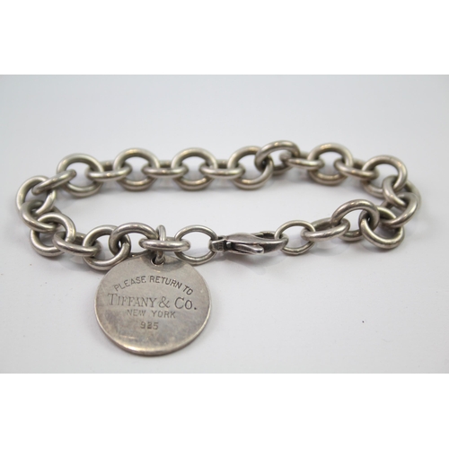 169 - Tiffany & Co sterling silver bracelet with tag charm (36g)