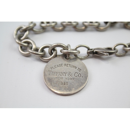 169 - Tiffany & Co sterling silver bracelet with tag charm (36g)