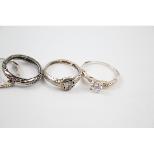 182 - Eight sterling silver Cubic Zirconia rings (22g)