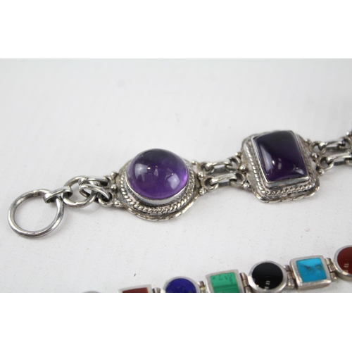 201 - Two sterling silver gemstone bracelets including amethyst, lapis lazuli (65g)