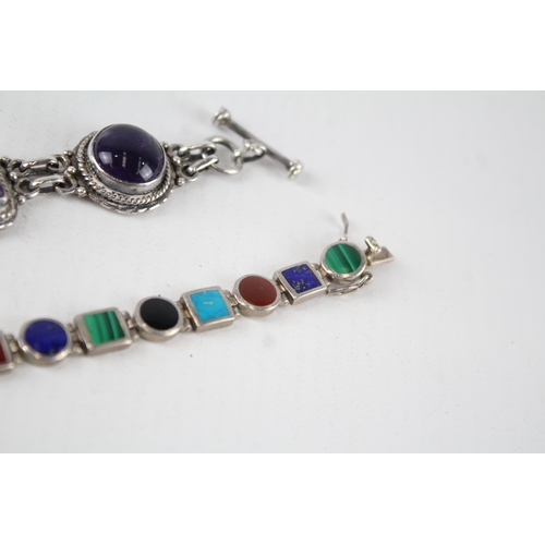 201 - Two sterling silver gemstone bracelets including amethyst, lapis lazuli (65g)