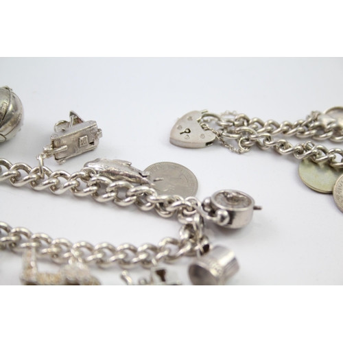 230 - Vintage sterling silver charm bracelet packed with charms (88g)