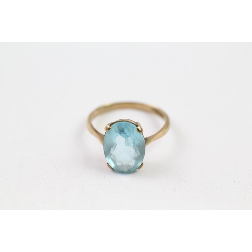 121 - 9ct gold blue paste solitaire ring (2.5g) Size  N