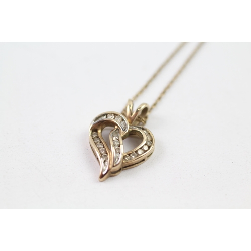 137 - 9ct gold diamond heart pendant & chain (3g)