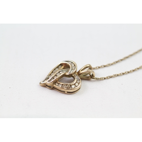 137 - 9ct gold diamond heart pendant & chain (3g)