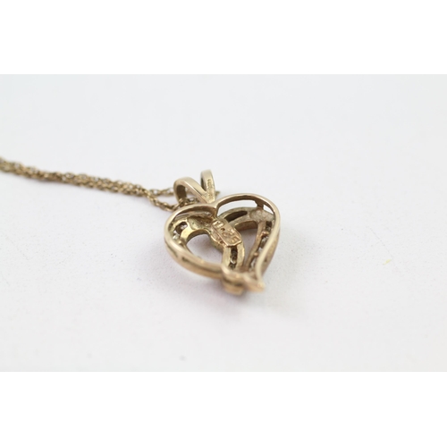 137 - 9ct gold diamond heart pendant & chain (3g)