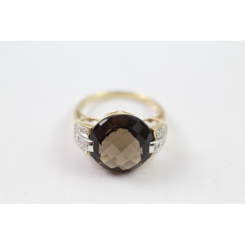 142 - 9ct gold faceted smokey quartz & diamond dress ring (5.1g) Size  O