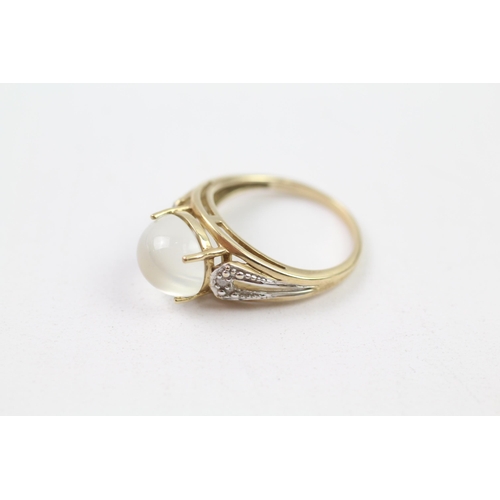 143 - 9ct gold white cats eye & diamond dress ring (4g) Size  P 1/2