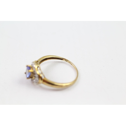 147 - 9ct gold tanzanite & diamond halo ring (2.1g) Size  O 1/2