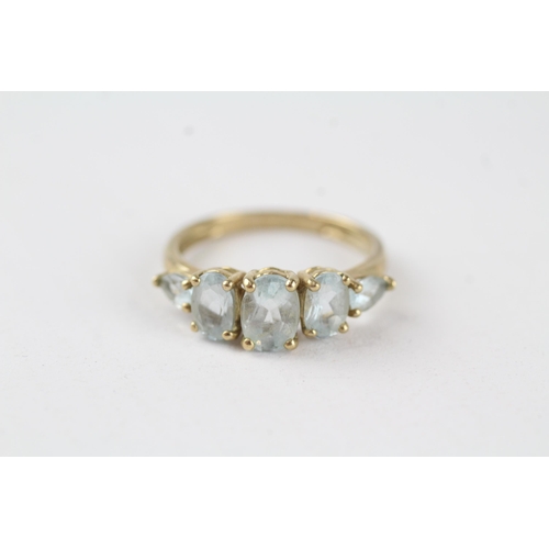 21 - 9ct gold blue gemstone eternity ring (2.3g) Size  O