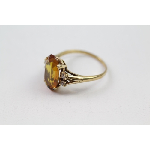 60 - 9ct gold citrine & diamond dress ring (3.1g) Size  Q 1/2