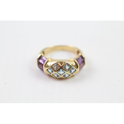 62 - 14ct gold blue topaz & amethyst dress ring (4.3g) Size  M