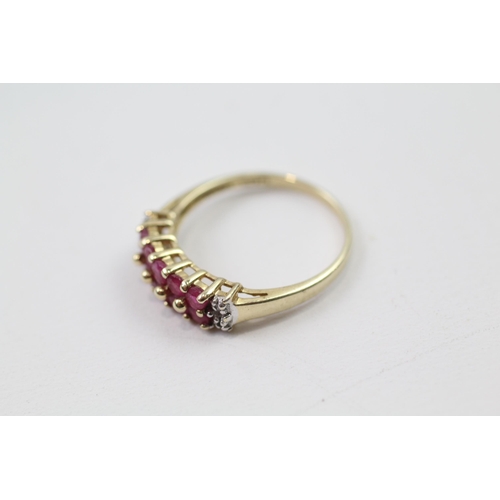 64 - 9ct gold ruby & diamond half eternity ring (2.1g) Size  P