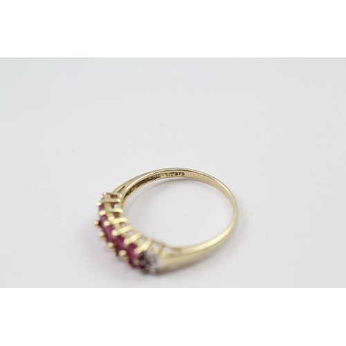 64 - 9ct gold ruby & diamond half eternity ring (2.1g) Size  P