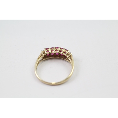 64 - 9ct gold ruby & diamond half eternity ring (2.1g) Size  P