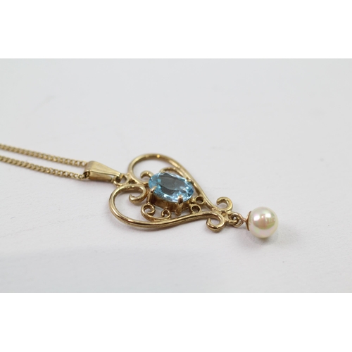 66 - 9ct gold vintage blue topaz & cultured pearl pendant (2.4g)