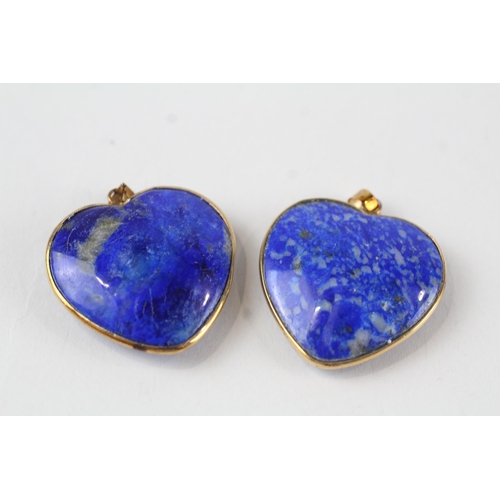 69 - 2x 9ct gold heart shaped lapis pendants (12.6g)