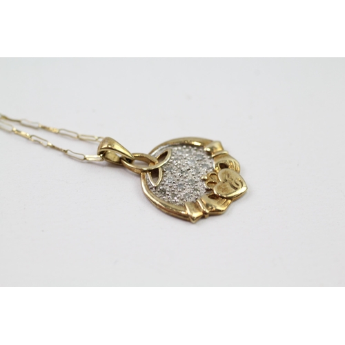 72 - 9ct gold diamond Claddagh pendant & chain (3g)