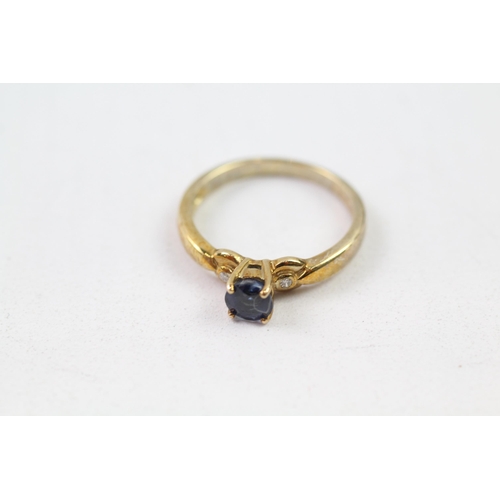 77 - 9ct gold blue gemstone & diamond solitaire ring (2.4g) Size  N