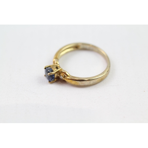 77 - 9ct gold blue gemstone & diamond solitaire ring (2.4g) Size  N