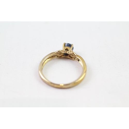 77 - 9ct gold blue gemstone & diamond solitaire ring (2.4g) Size  N