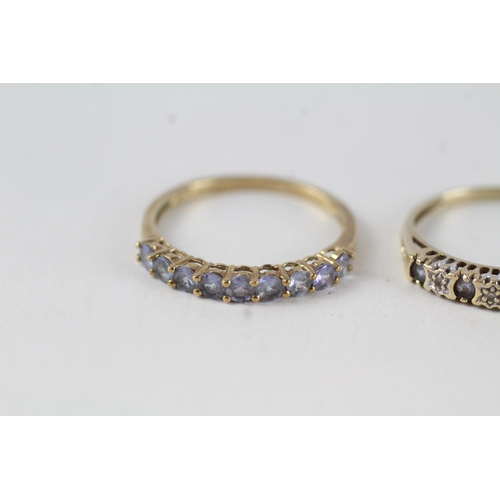 80 - 2x 9ct gold tanzanite & diamond half eternity rings (3g) Size  P + P