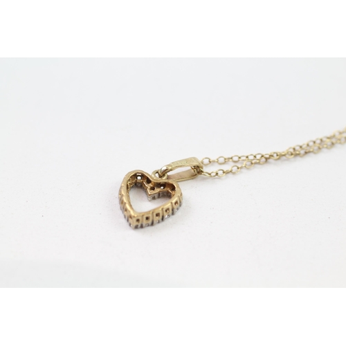 85 - 9ct gold diamond heart pendant & chain (1.9g)