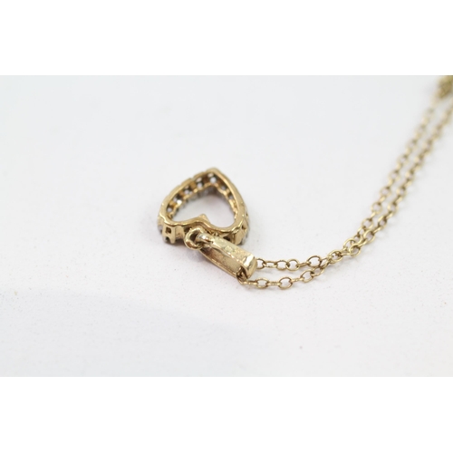 85 - 9ct gold diamond heart pendant & chain (1.9g)