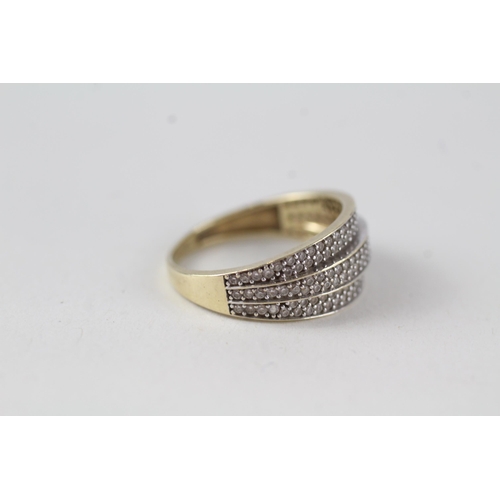 87 - 9ct gold three row CZ half eternity ring (2.3g) Size  L