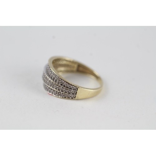 87 - 9ct gold three row CZ half eternity ring (2.3g) Size  L