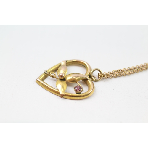 91 - 9ct gold garnet floral pendant & chain (3.4g)