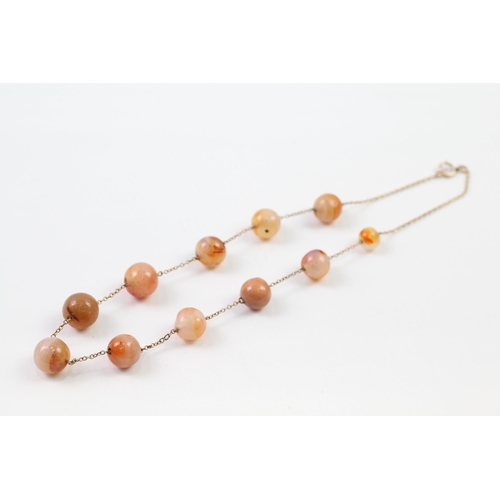 93 - 9ct gold agate bead necklace (27.1g)