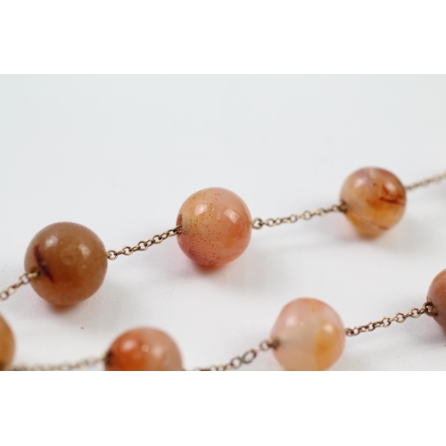 93 - 9ct gold agate bead necklace (27.1g)