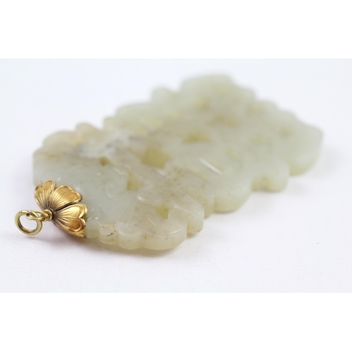 94 - 14ct gold nephrite Chinese wedding symbol pendant (26.2g)