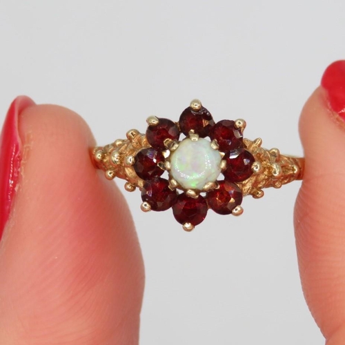 387 - 9ct Gold opal and garnet ring size M (2g)