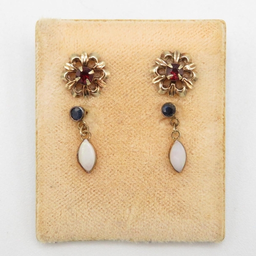 396 - 2x sets earrings with garnets and opals