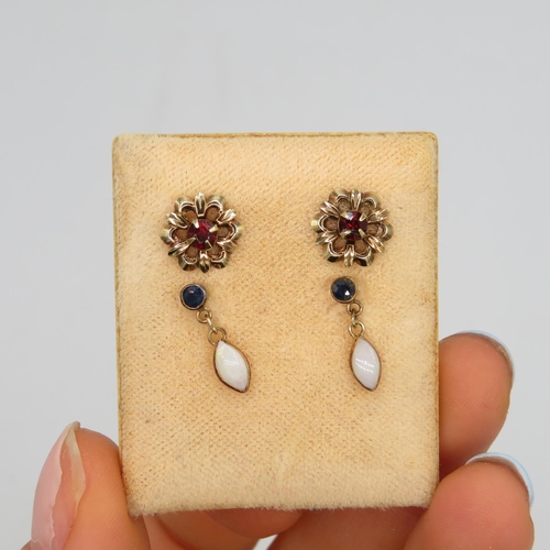 396 - 2x sets earrings with garnets and opals